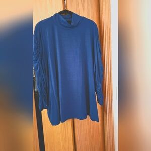 Plus size mock neck blouse.